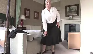 Granny April strips and savorily jerks off her old cunt