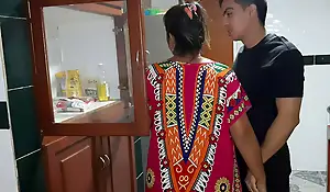 My stepmom gives me a blowjob in the kitchen