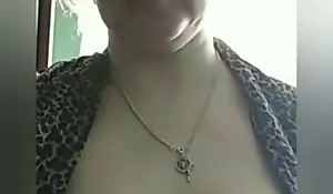 Russian woman undresses regarding shtick of the camera and masturbates