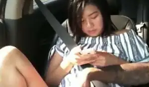 labelling Asian girl in car