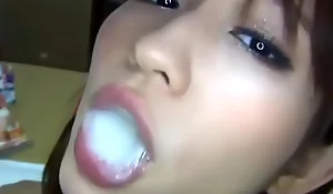 Japanese girl swallows also fuze loads of thick cum
