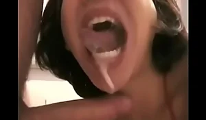 Asian girl gives a nice blowjob