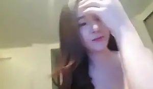 Korean cam model shows she has milk in her titties