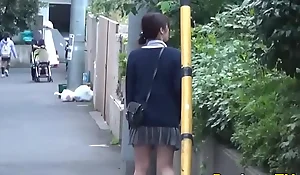 Asian babe pees publicly