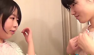 Japanese teen lesbian fingers her pussy
