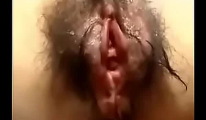 Hairy Asian girl masturbations on her period